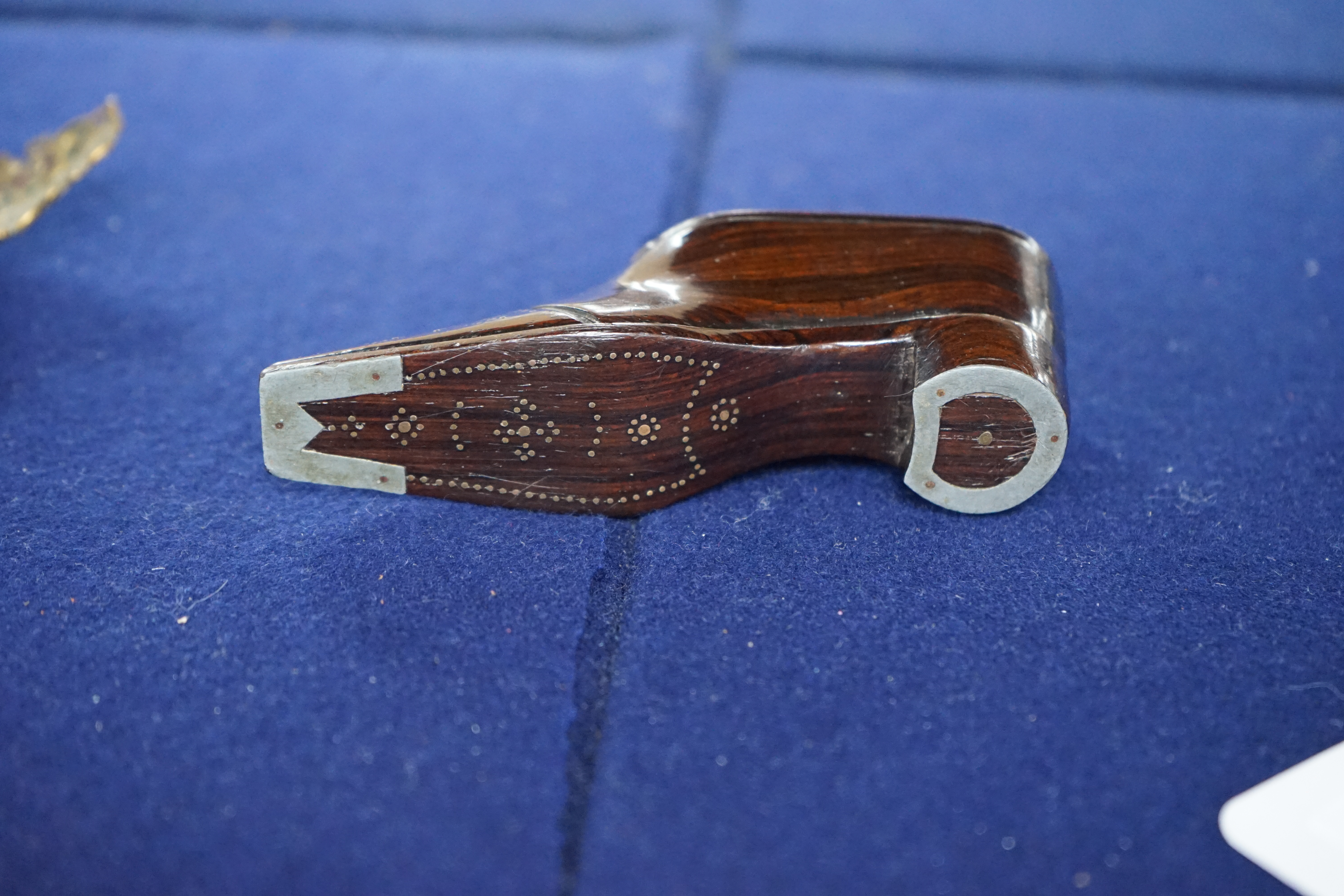 A 19th century rosewood and pique work snuff shoe, 11cm long. Condition - fair to good